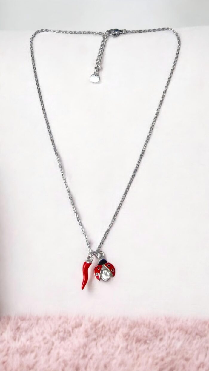 Collana In Acciaio Con Pendenti Corno Coccinella Argento - Chic mode germogli