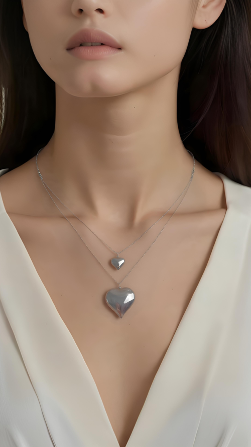 collana in acciaio con due ciondoli cuore dal vivo - chic mode germogli